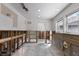Kitchen in the middle of remodeling with exposed framing, new windows and recessed lighting at 3007 Avenue F # 1, Holmes Beach, FL 34217