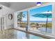 Kitchen sink featuring granite counters, stainless appliances, and beach view at 3007 Avenue F # 1, Holmes Beach, FL 34217