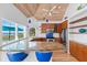Open kitchen featuring granite counters and beach view at 3007 Avenue F # 1, Holmes Beach, FL 34217