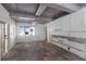 Spacious kitchen featuring beautiful tile floors, wood ceilings, and bright natural light at 3007 Avenue F # 1, Holmes Beach, FL 34217