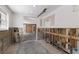 Kitchen in the middle of remodeling with exposed framing, new windows and recessed lighting at 3007 Avenue F # 1, Holmes Beach, FL 34217