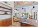 Open kitchen/living room featuring granite counters, stainless appliances, and beach view at 3007 Avenue F # 1, Holmes Beach, FL 34217