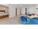 Bright open-plan living space with coastal decor and ocean views at 3007 Avenue F # 1, Holmes Beach, FL 34217