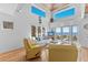 Bright living room features beach view, wood floors, and modern decor at 3007 Avenue F # 1, Holmes Beach, FL 34217
