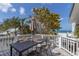 Outdoor patio featuring a large dining table and beautiful ocean views at 3007 Avenue F # 1, Holmes Beach, FL 34217