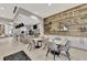 Charming cafe with modern decor, white tables and chairs, and a wood-paneled wall at 3118 Tramonto Ct, Bradenton, FL 34211