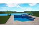 Rendering of a custom pool with a jacuzzi, palm trees and a lake view at 3118 Tramonto Ct, Bradenton, FL 34211