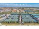 Aerial view of the community's tennis courts, showcasing the manicured landscaping and surrounding neighborhood at 3118 Tramonto Ct, Bradenton, FL 34211