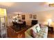 Open living space with dining room and hardwood floors at 3807 Lake Bayshore Dr # H-416, Bradenton, FL 34205