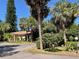 Condo community with mature palm trees and lush landscaping in a tropical setting at 3810 75Th W St # 116, Bradenton, FL 34209