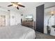 Bright bedroom with a sliding glass door to the outside, neutral decor, and private bathroom at 4224 Madeira Ct # 3309, Sarasota, FL 34233