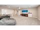 Spacious bonus room with large TV, beanbag chairs, and plenty of space at 3360 Chestertown Loop, Bradenton, FL 34211