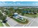 Community entrance with lush landscaping and water features at 3360 Chestertown Loop, Bradenton, FL 34211