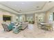Community space with seating areas and a large TV at 3360 Chestertown Loop, Bradenton, FL 34211