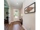 Light and bright entryway with wood-look flooring at 3360 Chestertown Loop, Bradenton, FL 34211