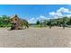 Charming community playground with playhouse at 3360 Chestertown Loop, Bradenton, FL 34211