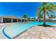 Expansive community pool with a large sundeck and poolside amenities at 3360 Chestertown Loop, Bradenton, FL 34211