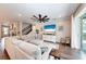 Open living space, sectional sofa, and hardwood floors at 3360 Chestertown Loop, Bradenton, FL 34211