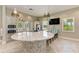Modern kitchen with granite countertop and stainless steel appliances at 3360 Chestertown Loop, Bradenton, FL 34211