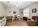 Home office with wood-look flooring and built-in shelving at 3360 Chestertown Loop, Bradenton, FL 34211