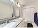 Clean bathroom with double sinks and a shower/tub combo at 3360 Chestertown Loop, Bradenton, FL 34211
