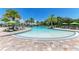 Inviting community pool with ample lounge chairs for sunbathing at 3360 Chestertown Loop, Bradenton, FL 34211