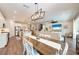 Open concept dining room adjacent to kitchen and Gathering room at 3360 Chestertown Loop, Bradenton, FL 34211