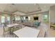 Relaxing community room with seating, tables, and a kitchen at 3360 Chestertown Loop, Bradenton, FL 34211