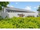 Casa Del Sol community entrance with lush landscaping at 4224 Madeira Ct # 3309, Sarasota, FL 34233