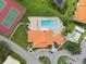 Community pool and clubhouse with tennis courts visible at 4224 Madeira Ct # 3309, Sarasota, FL 34233