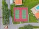 Two tennis courts in a residential community setting at 4224 Madeira Ct # 3309, Sarasota, FL 34233