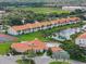 Community clubhouse and pool, near tennis courts at 4224 Madeira Ct # 3309, Sarasota, FL 34233
