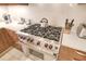 Stainless steel appliances and gas cooktop in this modern kitchen at 915 Seaside Dr # 312 Weeks 8-9, Sarasota, FL 34242