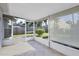 Spacious screened porch overlooking the backyard at 6933 43Rd E Ct, Sarasota, FL 34243