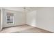 Bright bedroom with window and ceiling fan at 6933 43Rd E Ct, Sarasota, FL 34243