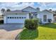 Charming one-story home with a two-car garage and well-maintained lawn at 6933 43Rd E Ct, Sarasota, FL 34243