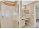 Clean bathroom with shower and updated vanity at 6933 43Rd E Ct, Sarasota, FL 34243