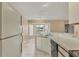 Bright kitchen features ample counter space and updated appliances at 6933 43Rd E Ct, Sarasota, FL 34243