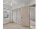 Well-lit bedroom with large closet and window at 6933 43Rd E Ct, Sarasota, FL 34243