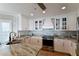 Modern kitchen with white cabinets and granite countertops at 4449 Bay Club Dr, Bradenton, FL 34210