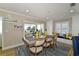 Dining area with water views and stylish decor at 4449 Bay Club Dr, Bradenton, FL 34210