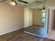 Bedroom with mirrored closet and ceiling fan at 3810 75Th W St # 116, Bradenton, FL 34209