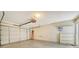 Spacious garage with overhead door and ample storage at 5956 Clubside Dr # 7651, Sarasota, FL 34243