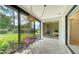 Enjoy your morning coffee in this screened patio overlooking the backyard at 5956 Clubside Dr # 7651, Sarasota, FL 34243