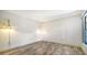 Bright bedroom with wood-look flooring and window at 5956 Clubside Dr # 7651, Sarasota, FL 34243