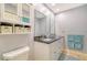 Bathroom with double vanity, granite countertop, and updated fixtures at 5956 Clubside Dr # 7651, Sarasota, FL 34243