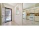 Inviting entryway with kitchen partially visible, offering an open floor plan at 5956 Clubside Dr # 7651, Sarasota, FL 34243