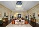 Elegant community clubhouse lobby with high ceilings and comfortable seating at 5956 Clubside Dr # 7651, Sarasota, FL 34243