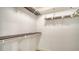 Walk-in closet with wire shelving providing ample storage at 5956 Clubside Dr # 7651, Sarasota, FL 34243