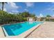Community pool with plenty of surrounding patio space at 5956 Clubside Dr # 7651, Sarasota, FL 34243